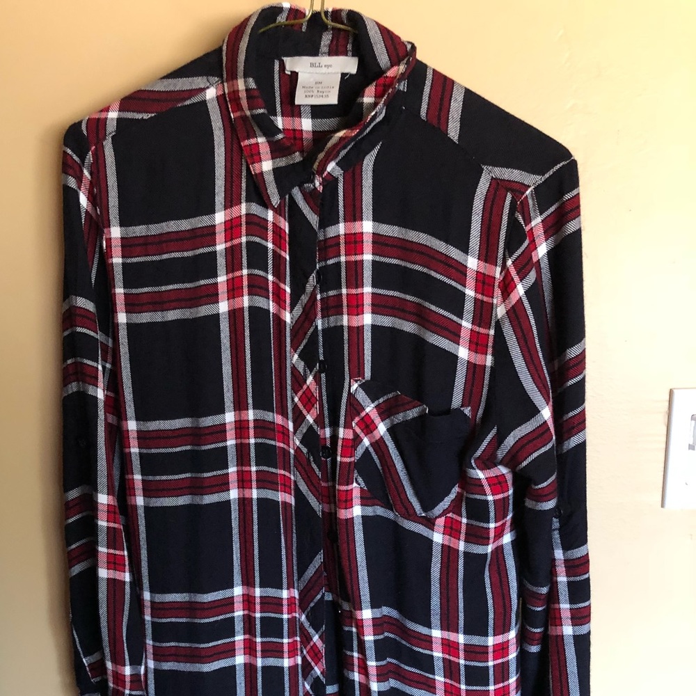 Plaid, knee length cardigan.